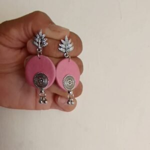 Pink fabric and oxcidsed silver earring