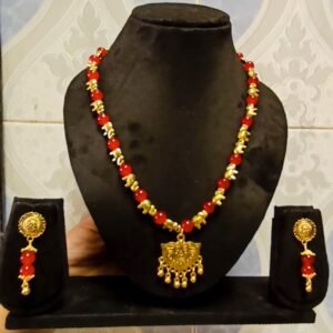 Red beads and golden beads and golden pandnet necklace set