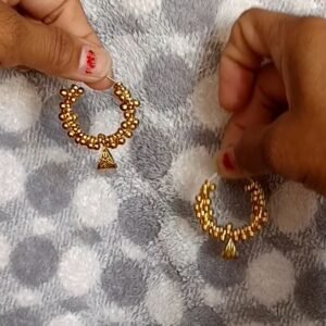 Oxcidsed gold earring