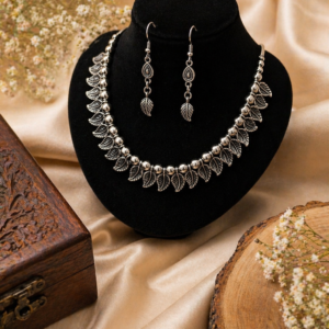 Latika silver oxidised necklace set with earrings