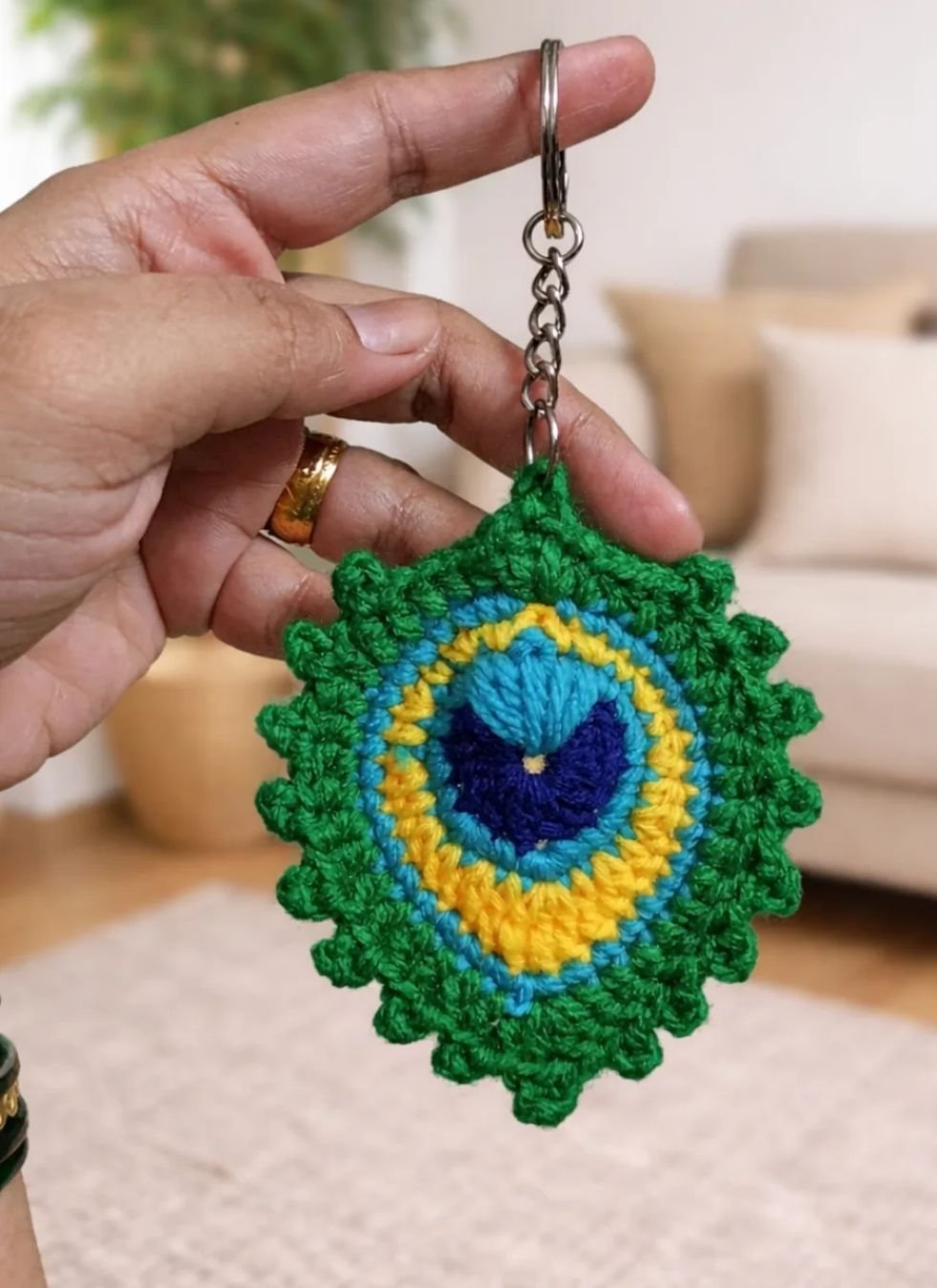 Crochet peacock feather keychain