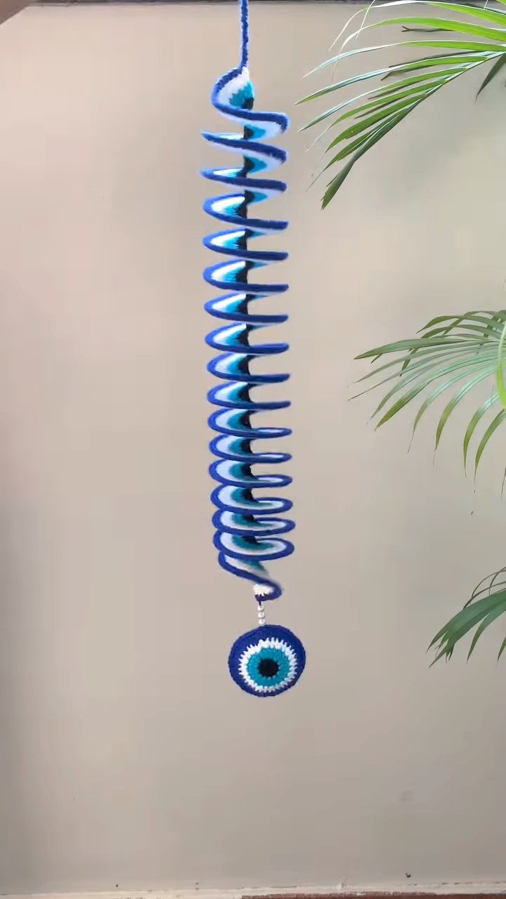 Crochet evil eye wind spinner