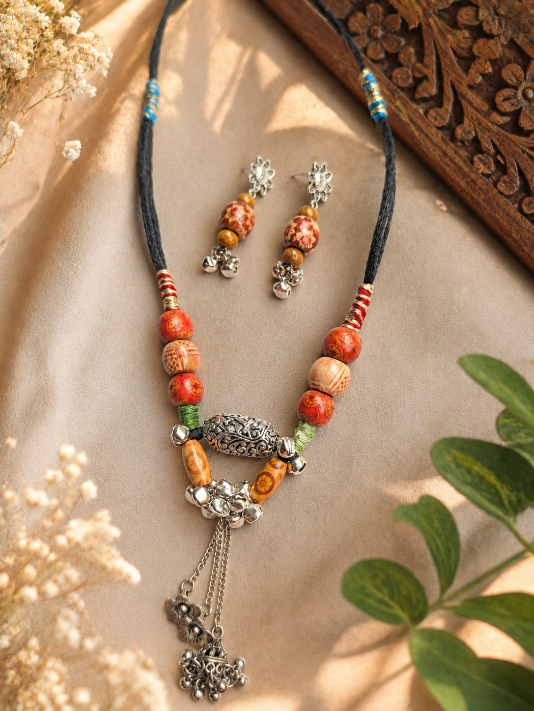 Navya handcrafted long necklace with earrings