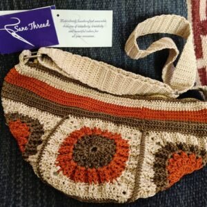 Handmade cross body bag with adjustable strap